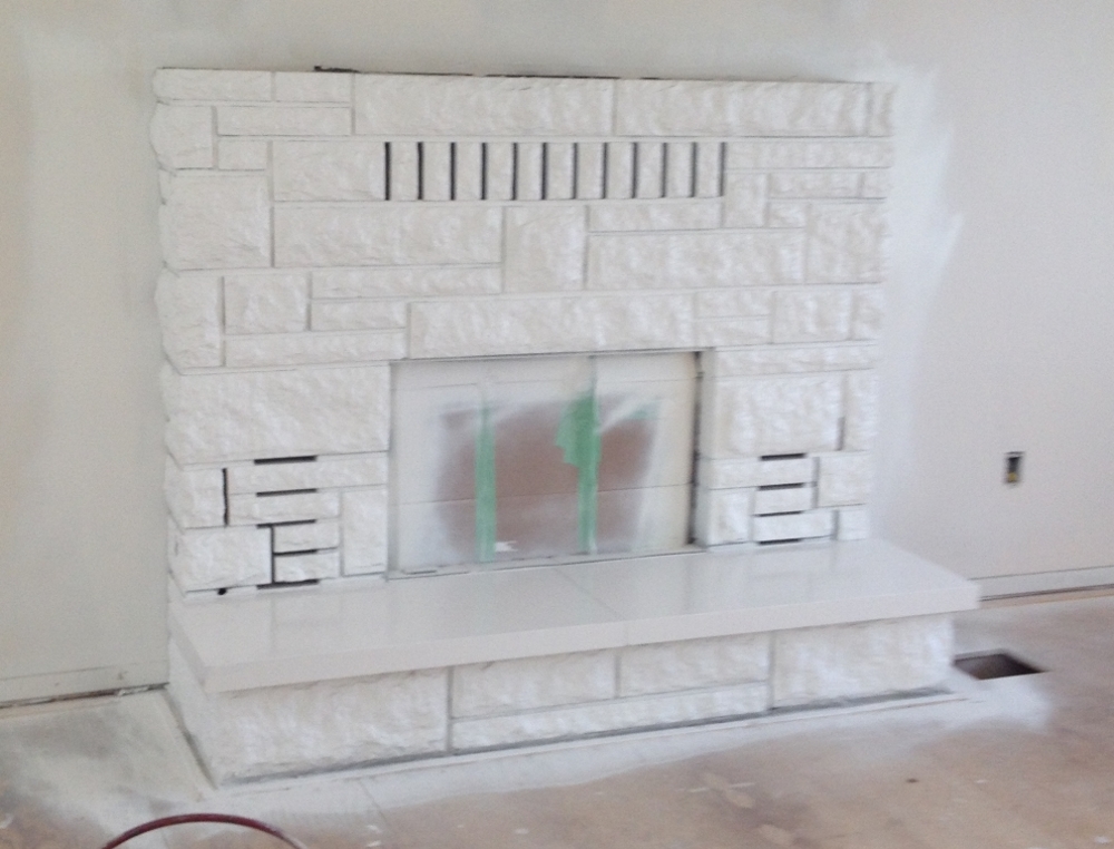 painting concrete fireplace - after