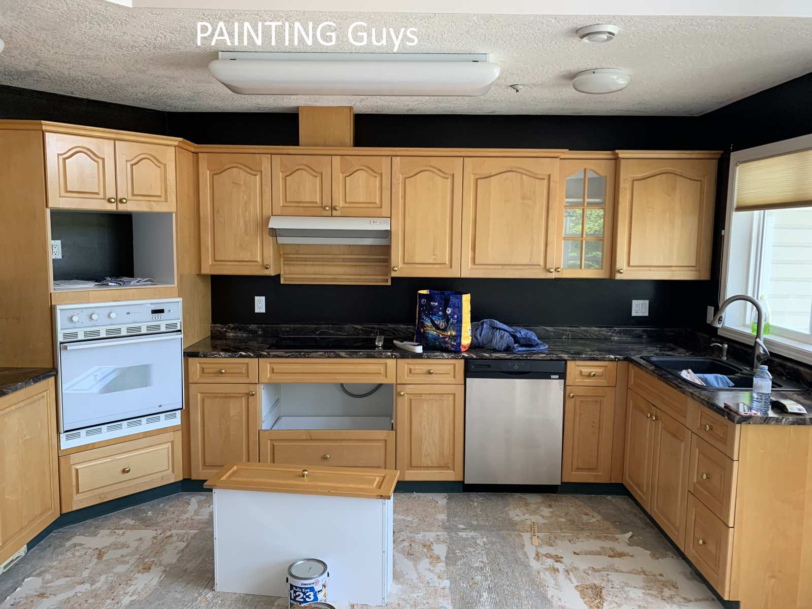 Cowichan Bay kitchen cabinet painting