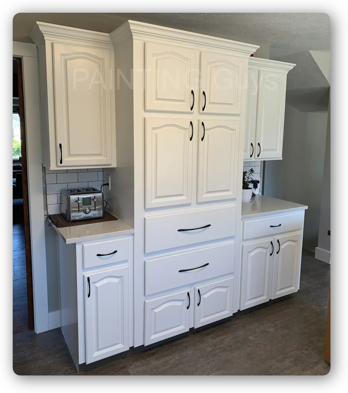 Oak cabinets refinished in Cloud White - Karly