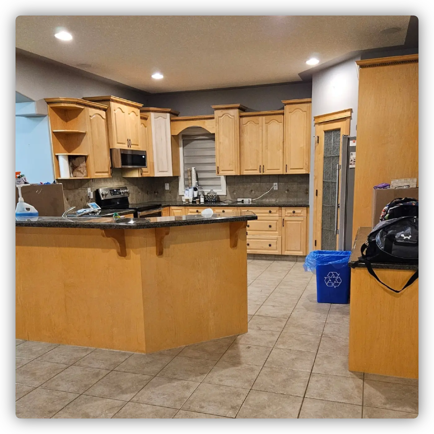 Maple kitchen cabinets refinished and painted in Chantilly Lace - PAINTING Guys Edmonton edmonton